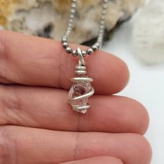 "Beautiful raw Lake County Diamond wrapped with sterling silver wire includes a stainless steel ball chain or a black or brown faux suede adjustable cord (adjusts from about 12\"-24\") If you prefer a sterling silver chain, you can find them here - https://www.etsy.com/listing/757293463/sterling-silver-rolo-chain?ga_search_query=chain&ref=shop_items_search_1 ◇ Meaning As a type of Quartz, Lake County Diamonds exhibit the properties of Quartz such as protection, energy, and power. Lake County Adjustable Nickel-free Round Pendant Crystal Necklace, Adjustable Sterling Silver Crystal Necklaces For Healing, Adjustable Wire Wrapped Sterling Silver Necklace, Adjustable Sterling Silver Wire Wrapped Necklace, Adjustable Silver Crystal Spiritual Necklace, Adjustable Silver Crystal Necklace Spiritual, Adjustable Silver Spiritual Crystal Necklace, Adjustable Silver Crystal Necklace Gift, Silver Adjustable Crystal Necklace For Gift