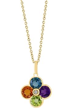 A semiprecious stone flower pendant brings sparkling color to an elegant 14-karat yellow-gold necklace centered by a dainty diamond. 18" length; 1/2"W x 3/4"L pendant Lobster clasp closure Total diamond weight: 0.02ct. Color: H–I Clarity: I1–I2 14k gold/citrine, London blue topaz, amethyst and/or peridot/diamond Made in the USA Diamond Guide Diamond Flower Pendant, Diamond Guide, Flower Pendant Necklace, Diamond Flower, London Blue Topaz, London Blue, Flower Pendant, Stone Jewelry, Blue Topaz