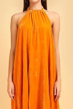 Shop for Label Ivish Orange Silk Velvet Halter Neck Asymmetric Dress for Women Online at Aza Fashions Chic Sleeveless Velvet Midi Dress, Sleeveless Velvet Mini Dress For Evening, Velvet Sleeveless Mini Dress For Evening, Sleeveless Velvet Midi Party Dress, Sleeveless Velvet Midi Dress For Party, Sleeveless Summer Velvet Dress, Sleeveless Velvet Midi Cocktail Dress, Velvet Maxi Dress For Cocktail Occasions, Summer Velvet Party Dress