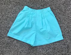 "1980's Sears brand Goola Gong seafoam green high waisted shorts! When I first saw these, all I could think of was Suzanne Somers in \"Three's Company\"! These have pleating at the front, wide legs with cuffs, side pockets and a front buttoning waistband. Back waistband is shirred elastic (in good condition). These are clean and in excellent condition. There's just a tiny spot on right front waistband. Label: Goola Gong by Sears - Size Missy Small - 40% Polyester, 39% Nylon, 21% Cotton - Made in 1930s Fashion Dresses, 1930s Dress, 80s Nostalgia, Cottagecore Style, Plaid Vest, Boho Style Dresses, 1930s Fashion, Rayon Dress, Cuffed Shorts