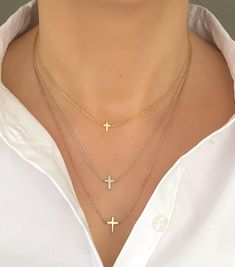 Handmade item Materials: Gold, Silver Made to Order Description Delicate and timeless Affordable Luxury minimalist style cross necklaces. You will love this fashion yet stylish dainty cross necklace. FEATURES Material: Crafted in High Quality 925 Sterling Silver Finish: 18K gold plated. 14K Solid Gold is also available. Color: Silver, Gold, Rose Gold Dimensions: Cross sizes are 6mm, 8mm and 10mm. Each SILVER jewelry comes with a complimentary chain extender. Cross Neckless, Circle Charm Necklace, Cross Necklace Gold, Diamond Circle Necklace, Dainty Cross Necklace, World Map Necklace, World Necklace, Tiny Necklace, Bridesmaids Gift Sets