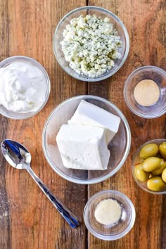 the ingredients to make an appetizer include olives, cheese and sour cream