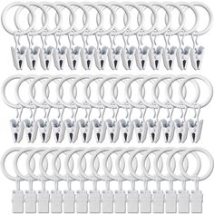 12 pairs of white ear buds with hooks and clips