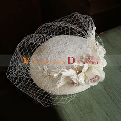 Vintage Retro Pearl Flower Fascinator Hat for Wedding Condition: Brand NewColor: BlackSize: One Size(Diameter: 14cm)Material: LinenSuitable season: Spring/Summer/Autumn/ WinterPopular elements:  Pearl,Flower,LaceOccasion : Wedding/Birthday/Holiday/Anniversary Celebration/Anniversary CelebrationWhat is a Fascinator ?Fascinators have received a lot of attention since the Royal Wedding of Prince William to Catherine Middleton last spring. These not-quite-hats, not-quite-barrettes are a great way to Fitted Flower Fascinator For Wedding, Flower Shaped Fitted Mini Hats For Weddings, Elegant Spring Bridal Accessories For Ceremony, Spring Wedding Flower Headpieces, Elegant Summer Bridal Accessories For Ceremony, Elegant Summer Mini Hat With Flower Shape, Flower Decoration Fascinator For Weddings, Elegant Flower Headpieces For Summer, Elegant Flower Mini Hat For Summer