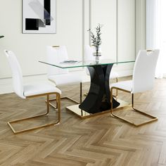 a glass dining table with white chairs and a vase on the end, in an empty room