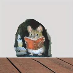 a painting of a mouse reading a book