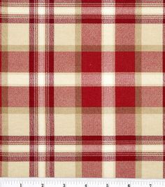 a red and white plaid fabric with a ruler in front of the checkerboard pattern