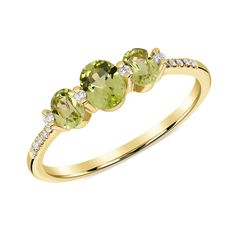 The Commodores told us, “Once, twice, three times a lady…” This 18k gold and Peridot ring is the consummate expression of femininity and elegance. Peridot are known to stimulate the Heart and Crown Chakra, breaking down our barriers and helping us to connect with others. Because after all, a lady always knows…Scroll down to Gem Guide below to learn more about Peridot. Measurement: 4.3 x 7.5 x 1.7 mm Shank: 1.4 mm Weight: 1.899 grams 18k gold Please allow 4-6 weeks for production. Formal Peridot Diamond Ring In Yellow Gold, Elegant Three Stone Peridot Ring, Elegant Peridot Promise Ring, Formal Yellow Gold Three Stone Rings, Formal Peridot Diamond Ring With Center Stone, Peridot Rings With Brilliant Cut In Fine Jewelry Style, Yellow Gold Peridot Diamond Ring, Oval Peridot Diamond Ring For Formal Occasions, Fine Jewelry Peridot Rings With Brilliant Cut