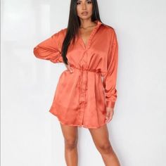 Oversized Satin Shirt Oversized Long Sleeve Shirt Dress For Brunch, Oversized Long Sleeve Mini Dress For Day Out, Orange Long Sleeve Shirt Dress For Fall, Oversized V-neck Shirt Dress For Fall, Tying Oversized Shirt, Oversized Long Sleeve Mini Dress For Daywear, Oversized Button Up Shirt Dress Satin, Cheap Oversized Orange Shirt, Long Sleeve Red Mini Dress For Daywear