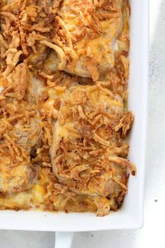 a casserole dish filled with meat and cheese