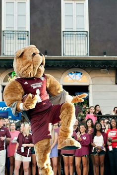 a person in a mascot costume doing a trick