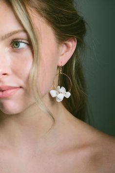 White Flower Hoop Dangle Earrings, Floral Earrings, Bridal Flower Earrings, Wedding Flower Jewelry, Bridal Dangle Earrings, Flower Earrings Handcrafted with beautiful blossomed clay flowers and pearl centers, this earring set will surely be a statement piece at your special event! They are the last item to complete your fairy princess bridal look! DETAILS * Color: Wire (silver or gold), Flowers (white) * Length: 1.5-2 inches SHIPPING INFORMATION * Most items listed in my store are in stock and c Bridal Flower Earrings, Summer Wedding Flower Earrings, Flower Earrings Wedding, Bridal Dangle Earrings, Wedding Flower Jewelry, Silver Earrings Wedding, Boho Wedding Earrings, Bridal Jewelry Sets Brides, Flower Hoop Earrings