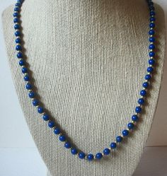 My Shop has been a 5 star seller since 2021 and is featuring this jewelry for your consideration MONET Vintage 28" Necklace, Blue Old Plastic, Gold Tone Spacer Beads 012821 Previously owned and In very good Vintage condition. Please, contact us if you any questions. Beautiful necklace! Please see my other listings for more vintage jewelry- I am happy to combine the shipping. Thanks so much!  Beautiful necklace! Please see my other listings for more vintage jewelry- I am happy to combine the shipping. Thanks so much! Blue Beaded Necklace For Costume Jewelry, Blue Necklaces With 8mm Beads For Jewelry Making, Blue Costume Jewelry Necklaces With Polished Beads, Blue Single Strand Costume Jewelry, Adjustable Blue Necklaces With 8mm Beads, Blue Costume Jewelry Beaded Necklace With Faceted Beads, Blue Beaded Necklaces For Jewelry Making (8mm Beads), Blue Beaded Lapis Lazuli Jewelry, Blue Adjustable Necklace With 8mm Beads