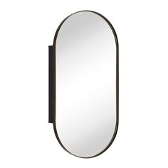 a mirror that is on the wall with a black frame and metal trim around it