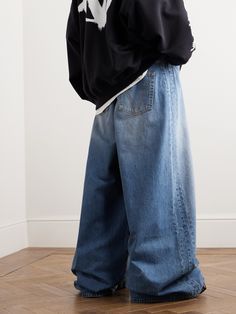 Vetements is known for its exaggerated proportions and its dramatic 'Big Shape' jeans are named for their slouchy, wide-leg fit. They're cut from lightly faded blue denim and the hems are meant to touch the floor. Affordable Denim Blue Outerwear For Streetwear, Cheap Hip Hop Bottoms In Medium Wash, Mens Baggy Jeans Sewing Pattern, Baggie Jeans Boys, Blue Uk Drill, Cheap Men's Streetwear Windbreaker, Wide Cut Jeans, Jean Ideas Diy, Big Trousers Outfit