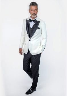 This Alabaster White Twill Tuxedo is the epitome of fashion style and sophistication. Crafted with meticulous attention to detail, this custom-made tuxedo will be a stunner. Enjoy the ultra formal look with this exquisite white tuxedo, fully customizable for you. Black satin peak lapels and accents distinguish this one button look - well paired with a black or white vest underneath. Alabaster White, Custom Made Suits, Blue Tuxedos, White Tuxedo, White Vest, Black Bow Tie, Body Posture, Body Proportions, Tuxedo Shirts