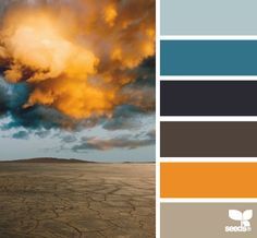 the color palette is blue, yellow and brown with clouds in the sky above it