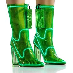 The Party Don’t Start Till You Walk In! Light Up The Dancefloor At The Touch Of A Button In The Azalea Wang Lee Light Up Pvc Bootie In Green. This Festive Style Features A Pvc Upper, A Mid Calf Shaft, A Pointed Toe Silhouette, A Coordinating Clear Block Heel, And Light Up Trim Detailing Throughout. Complete With Tonal Faux Leather Accents, A Back Ankle Zipper Closure, And An Attached Battery Pack. Each Shoe Requires Two Aa Batteries. Batteries Not Included. (All Measurements Approximate From Siz Clear Block Heels, Azalea Wang, Heels Boots, Leather Accents, Aa Batteries, Battery Pack, Festival Fashion, Shoes Heels Boots, Chunky Heels