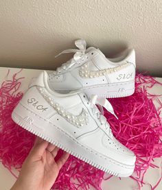 Make your day extra special with these beautiful and unique custom bridal sneakers! * Brand New 100% Authentic sneakers! * FREE SHIPPING within the US territory!  * Rhinestones/pearls Swoosh Bridal Custom made-to-order sneaker. * Hand-painted lettering on the outer sides of each shoe. Get them Personalized! - Size Guide- C (Child) Y (Youth) W (Women) M (Men.) - Acrylic Waterproof paint - ALWAYS Hand-Pianted, we never use stickers to make sure the shoes last a long time! - Available in Low, Mid, White Custom Sneakers With Rhinestones For Wedding, Custom Wedding Sneakers With Rhinestones, Wedding Custom Sneakers With Rhinestones And Round Toe, Wedding Low-top Sneakers With Rhinestones, Embellished Low-top Wedding Sneakers, Air Force 1 Wedding, Sneaker Wedding, Wedding Shoes Sneakers, Bridal Sneakers