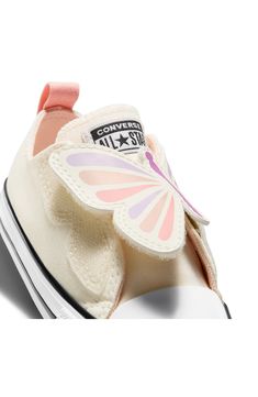 A butterfly strap lends kid-approved charm to this classic canvas sneaker cushioned with soft foam. Adjustable hook-and-loop strap Cushioned footbed Textile upper and lining/rubber sole Imported Pretty Shoes Sneakers, Infant Girls, Baby List, Casual Running Shoes, Baby Life, Stylish Kids, Converse Chuck Taylor All Star