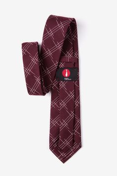 Update your wardrobe with the Escondido extra long tie. This burgundy accessory features a loose checkered pattern perfect for the office and semiformal events. Imported. Burgundy Semi-formal Suit And Tie Accessories, Burgundy Business Tie, Burgundy Standard Tie For Business, Elegant Plaid Suit And Tie Accessories For Business, Elegant Fitted Plaid Ties, Fitted Plaid Standard Tie, Plaid Fitted Standard Tie, Update Your Wardrobe, Special Birthday