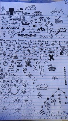 a piece of lined paper with doodles and writing on it, all over the page