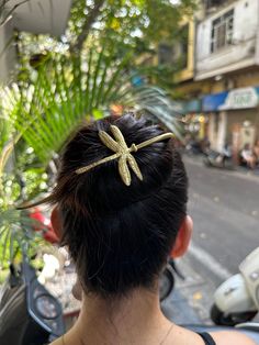 Dragonfly hair stick from solid brass. It is made from brass sheet and thick brass wire, soldered together using silver solder, hand-engraved, hammered, textured and gently polished. It also is very valuable addition for brass collectors. ►Handcrafted from 100% pure brass by Vietnam skilled craftsman. These hairpins are perfect for impressive outfit or can be a special gift for friends, family, business partner on any special occasions. Each product is unique because it is crafted through an ancient process. Each my jewelry is packed in gift wrapping. Dimentions Pin length 5.90 in (15cm)  Dragonfly width: 5.5cm ► Click here to find more jewelry & accessories: https://www.etsy.com/listing/1040045231/ginkgo-leaf-earrings-brass-ginkgo-leaf?ref=shop_home_active_20&pro=1&frs=1 Thank you for vis Brass Hair Pin, Brass Sheet, Dragonfly Jewelry, Copper Hair, Hair Stick, Butterfly Hair, Hair Comb Wedding, Business Partner, Hair Sticks