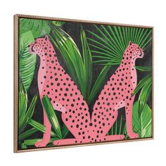 two pink leopards sitting in front of green leaves on a black background with gold trim