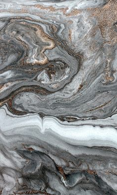 an abstract marble pattern with black, white and grey colors on it's surface