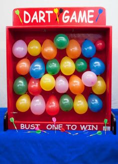 an old fashioned game with lots of balloons in it