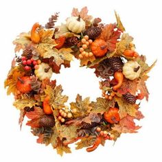 a wreath with autumn leaves and acorns on it is shown in front of a white background