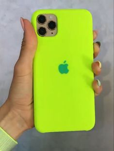 a person holding an iphone case in their hand