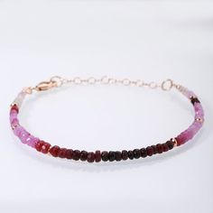 Queenly Ruby Faceted Rondelle Beaded Bracelet with adjustable silver clasp to add grace & elegance to your Hands.....Stone Color: Ombre RedStone Dimension : 3 MM to 4 MMStone shape : Faceted RondelleBracelet Length: 22 CmsCarat Weight : 29 (Approx.)NOTE: The length of the bracelet is 7-8 1/2" inches or 18-21cm from clasp to closure.Happy Shopping Jewelry Ruby, Round Bead Necklace, Ruby Bracelet, Ruby Beads, Tourmaline Bracelet, Turquoise Bead Necklaces, Jewelry Bridesmaid, Christmas Bracelet, Genuine Turquoise