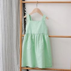 Add a touch of fun to your little one's summer wardrobe with our Bow Dress! Featuring adjustable shoulder straps and made from a blend of 70% cotton and 30% linen, this dress is perfect for sunny days. Get ready to bow down to this playful and stylish addition to your child's closet! Cotton Suspender Dress For Spring Vacation, Summer Cotton Sundress With Adjustable Straps, Casual Cotton Suspender Dress For Beach, Cotton Sundress With Adjustable Straps For Summer, Summer Cotton Suspender Dress With Adjustable Straps, Cotton Sleeveless Suspender Dress For Vacation, Summer Sleeveless Cotton Suspender Dress, Cotton Suspender Dress For Summer Vacation, Cotton Suspender Dress With Adjustable Straps For Summer