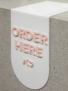 there is a sign that says order here