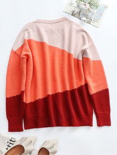 Our Elma knit jumper comes in a orange, beige & claret block print. It features a crew neckline and long relaxed sleeves for a comfortable, luxurious fit. This cute jumper is ideal for layering during the colder months. Size Guide: Melina is 5’6” tall, and has a 33.5” bust, 24.8”waist, & 37.4” hips. She is wearing a S / US 4 / AU 8. This jumper is true to size. Material: 52% acrylic / 28% polyamide / 20% polyester Key Features: Relaxed fit. Crew neckline. Long sleeves. Pull on style. Please note Orange Sweater For Layering In Fall, Orange Sweater For Fall Layering, Orange Color Block Long Sleeve Sweater, Trendy Orange Sweater For Layering, Fall Crew Neck Sweater With Color Matching, Orange Color Block Crew Neck Sweater, Orange Winter Tops For Layering, Orange Tops For Winter Layering, Red Knit Color Block Sweater