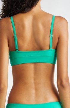 Channel bold energy in this bikini top featuring supportive underwire and adjustable straps for a personalized fit. Clasps at back Adjustable straps 74% polyamide, 26% elastane Hand wash, dry flat Made in Portugal Underwire Tankini With Adjustable Straps For Swimming, Triangle Top Tankini With Straps For Pool, Beachwear Tankini With Adjustable Straps And Underwire, Green Summer Bra With Adjustable Straps, Summer Green Bra With Adjustable Straps, Green Underwire Tankini With Built-in Bra, Padded Bandeau Swimwear For Poolside, Green Triangle Top Bra, Spaghetti Strap Swimwear With Padded Cups For Sunbathing