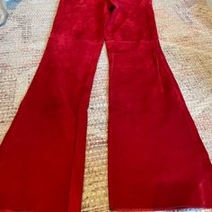 100% Leather/Suede Red Pants From Henri Bendel . Never Worn. With Tags . Slight Flare At The Bottom . Back Pockets Make For A “ Jean-Like” Fit. Beautiful! Purchased Too Big So Never Worn. 41 Inches Long Red Fitted Leather Pants, Suede Pants, Red Pants, Henri Bendel, Red Suede, Boot Cut, Pant Jumpsuit, Pants For Women, The 100