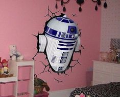 a star wars r2d2 wall decal in a child's bedroom