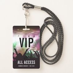 a lanyard with a concert ticket attached to it