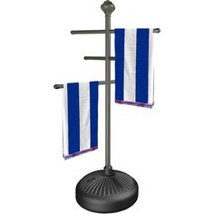 two blue and white towels hanging from a metal pole on top of a black stand