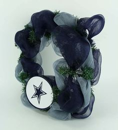 a wreath with a white and black star on it