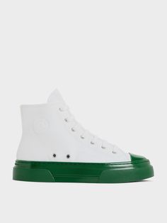 Make a bold statement whenever you step out in these Kay high-top sneakers. Thanks to the glossy, bright green soles that contrast with the pristine white uppers, these sneakers are eye-catching shoes that will turn heads everywhere. Set on comfortable and cushioned flatforms, they offer a modest lift. Plus points for the side-zips that make this pair a breeze to wear. White High Tops, Brand Collaboration, Faux Leather Heels, Size Chart For Kids, Charts For Kids, Holiday Stickers, Charles Keith, Kids Sale, Printables Kids