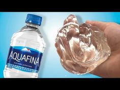 a hand holding a bottle of aquafina water next to an image of a flower