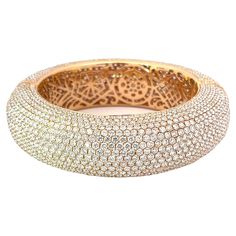 This an amazing & unique one-of-a-kind Jacob & Co. Diamond Bracelet Bangle made for Jennifer Lopez (as seen wearing in last picture). The bangle holds approximately 67 carats total weight of Diamonds. When worn, the top and outer edges of the bracelet show hardly any metal and purely the diamonds radiant shine. When you get glances of the inside of the bracelet, what you see is a beautiful, hand crafted delicate design made of 18K Rose Gold. The unique and unusual cut out shapes elevate the desi Jacob And Co, Bangles Making, Cut Out Shapes, Diamond Bangles Bracelet, Denim Skirt Women, Delicate Design, Diamond Bangle, Bracelet Bangle, 18k Rose Gold