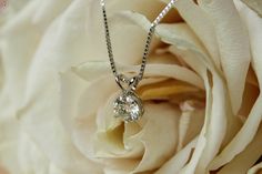 "A classic and elegant choice of necklace. With 1 - 2 ct size moissanite center stone. You are the most shinning star when wearing them! Just feel the sparkle from it. Anniversary gift for her, briald necklac, round moissanite necklace , wedding necklace , gift for mum, Christmas gift If you would like to have 14k 18k gold version, please check this listing: 💎Metal: Sterling silver/14k gold plated silver/ 14k gold/14k white gold/14k rose gold, 18k gold/18k white gold/18k rose gold 💎Stone: Roun Anniversary Solitaire Moissanite Necklace In White, White Moissanite Solitaire Necklace For Anniversary, Anniversary White Solitaire Moissanite Necklace, Delicate Round Cut Solitaire Necklace For Anniversary, Anniversary White Solitaire Necklace In Moissanite, White Solitaire Diamond Necklace For Anniversary, Dainty Solitaire Necklace With Prong Setting For Anniversary, Elegant Diamond Necklace For Anniversary, Anniversary White Moissanite Solitaire Necklace