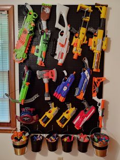 Nerf Fun Wall, Ninja Bedroom, Nerf Storage Ideas, Nerf Wall, Fortnite Room, Nerf Storage, Vintage Store Ideas