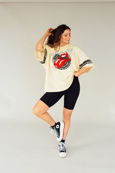 A mineral washed, graphic print tee with the following features: Vintage-style graphic of Rolling Stones style. Round neckline. Short sleeves. Dropped shoulders. Distressed detailing at neckline, cuffs, and hem. Relaxed fit. -Graphic Tee -Oversized Tee Sizing: Small: 0-4Medium: 6-8Large: 10-12 *Model is 5'8 and wearing a Small Print Tee, Oversized Tee, Printed Tees, Rolling Stones, Drop Shoulder, Round Neckline, Graphic Prints, Graphic Tee, Vintage Style