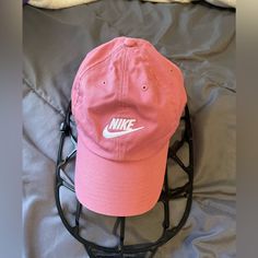 Women’s Pink Nike Hat. One Size But Adjustable Back. Great Condition. Never Worn Nike Casual Snapback Hat, Nike Baseball Cap, One Size Fits Most, Nike Casual Visor Hat, Casual Nike Visor Hat, Casual Nike Baseball Cap, Nike Snapback Hats For Spring, Nike Summer Cap, Nike Casual Hat For Spring, Nike Casual Cotton Hat