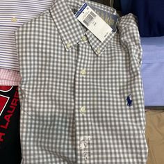 Polo Ralph Lauren Brand New With Tags Gray White Gingham Button Down Dress Shirt Long Sleeve Small Men’s Casual Collared Gingham Shirt, Casual Gingham Collared Shirt, Gingham Shirt With Buttons For Summer, Spring Plaid Shirt With Placket, Long Sleeve Gingham Shirt With Button Closure, Summer Gingham Shirt With Buttons, Classic Plaid Shirt For Spring, Preppy Plaid Collared Shirt, Long Sleeve Gingham Shirt With Buttons